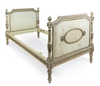 A Louis XVI Style Carved and Painted Day Bed Height 33 1/2 x width 27 1/2 x length 33 1/5 inches.