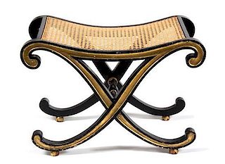 A Regency Style Black and Gilt Painted X-Form Tabouret Height 17 1/2 inches.