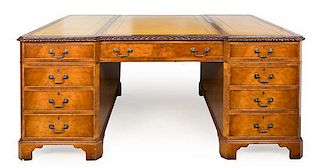 A George II Walnut Partner's Desk Height 31 x width 47 x length 72 inches.