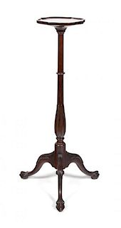 A Georgian Style Mahogany Candle Stand Height 36 x diameter 9 1/2 inches.