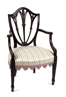 A Hepplewhite Style Mahogany Open Armchair Height 37 inches.