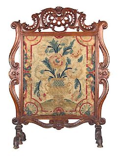 An Epoque Regence Wooden Fire Screen with Needlepoint Height 41 1/2 x width 31 inches.