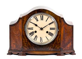 An English Walnut Cased Shelf Clock Height 9 x width 13 1/2 x depth 6 inches.
