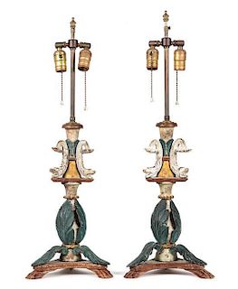 A Pair of Italian Carved and Painted Candlesticks Height 20 inches.
