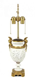 A Neoclassical Style Gilt Bronze Mounted Bisque Porcelain Urn Height of urn 13 3/4 inches.