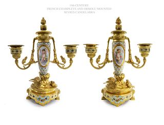A Pair of Champleve Sevres Figural Bronze Candelabras