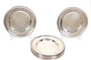 Twelve American Silver Side Plates 60 ozt 63 dwt; diameter 6 1/4 inches.