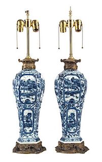 A Pair of Blue and White Porcelain Vases Height overall 30 inches.