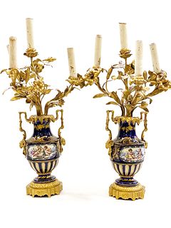 A Pair of French Sevres Porcelain/Bronze Candle Holders