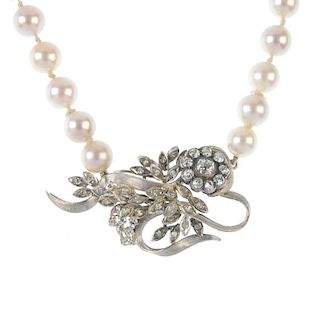 A cultured pearl and diamond necklace. The old and single-cut diamond floral spray, to the cultured