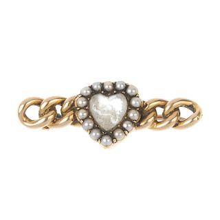 A late 19th century moonstone and split pearl composite brooch. The late 19th century heart-shape mo