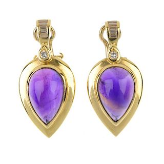 A set of amethyst and diamond jewellery. The pendant designed as a pear-shape amethyst cabochon, wit