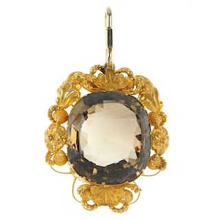 A late 19th century gold citrine pendant. The cushion-shape citrine, within a cannetille surround. L