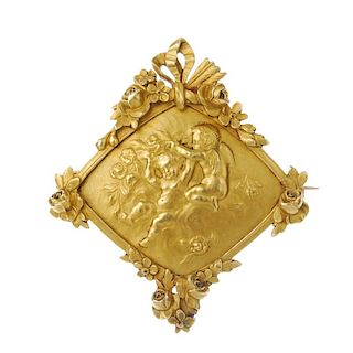 An early 20th century foliate panel brooch. Of kite-shape outline, depicting a cherub scene, to the