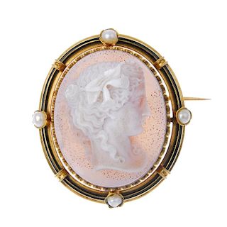 A late 19th century gold hardstone, split pearl and enamel cameo brooch. Carved to depict a bacchant