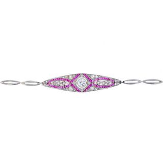 An early 20th century ruby and diamond bracelet. Of marquise-shape outline, the circular-cut diamond