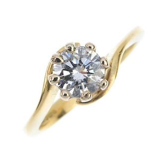 A diamond single-stone ring. The brilliant-cut diamond, to the crossover band. Estimated diamond wei