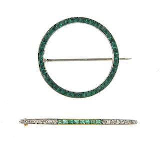 Two early 20th century diamond and gem-set brooches. To include an alternating square-shape emerald