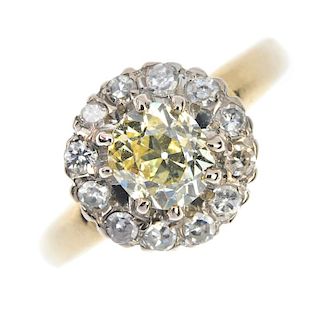 A mid 20th century 18ct gold diamond cluster ring. The old-cut diamond, within a single-cut diamond