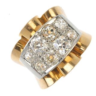 A mid 20th century gold and platinum diamond dress ring. The pave-set old-cut diamond rectangular-sh