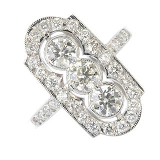 A diamond dress ring. The brilliant-cut diamond collet line, within a similarly-cut diamond surround