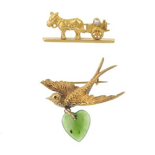 Two early 20th century gold gem-set brooches. To include a 15ct gold swallow brooch with suspended n