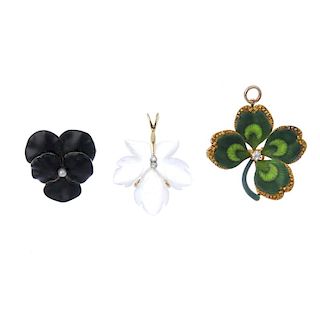A selection of early 20th century gold floral pendants. To include a brilliant-cut diamond and green