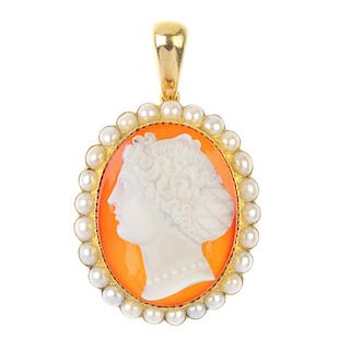 A late 19th century hardstone cameo and split pearl pendant. The oval cameo carved to depict a lady