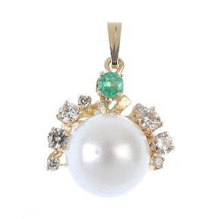 A cultured pearl, emerald and diamond pendant. The cultured pearl, measuring 13mms, with brilliant-c