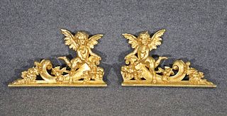 PAIR FIGURAL GILT WOOD WALL HANGING PLAQUES