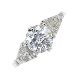 A single-stone diamond ring. The brilliant-cut diamond, weighing 1.02cts, with single-cut diamond tr