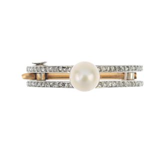 A platinum and 9ct gold cultured pearl and diamond clip. The cultured pearl, measuring 6mms, to the