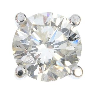 A single diamond ear stud. The brilliant-cut diamond, to the four-claw setting. Estimated diamond we