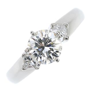 A platinum diamond single-stone ring. The brilliant-cut diamond, estimated weight 1.06cts, to the sq