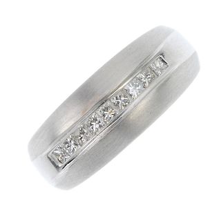 ADLER - an 18ct gold diamond half-circle eternity ring. The square-shape diamond line, within a chan