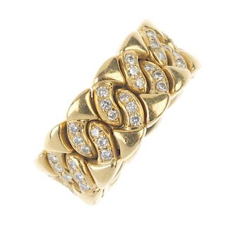 BULGARI - an 18ct gold diamond ring. Of flexible design, the brilliant-cut diamond, circular-shape l