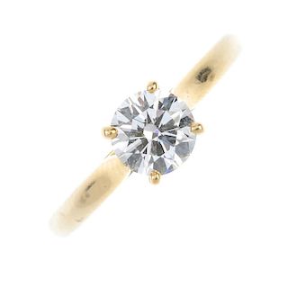 CARTIER - a diamond single-stone ring. The brilliant-cut diamond, weighing 0.73cts, to the plain ban