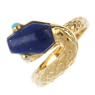 CARTIER - a gem-set snake ring. The head with hexagonal-shape lapis lazuli panel detail and turquois