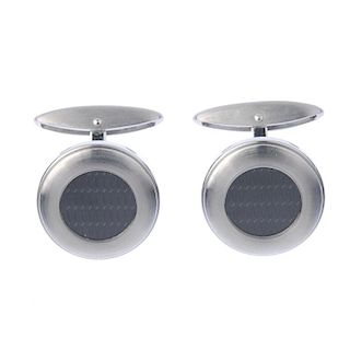 CHOPARD - a pair of 18ct gold and rubber 'Mille Miglia' cufflinks. Each designed as a circular panel