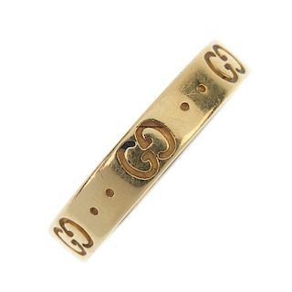 GUCCI - an 18ct gold 'Icon' band ring. The narrow band, decorated with signature double 'G' motif an