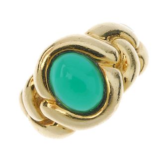 VAN CLEEF & ARPELS - a gem-set dress ring. The oval green chalcedony cabochon, to the interwoven sho