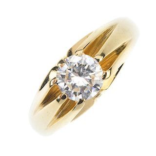 A gentleman's 18ct gold diamond single-stone ring. The brilliant-cut diamond, to the grooved sides a