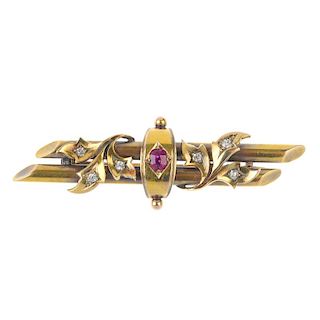 A late 19th century 15ct gold ruby and diamond brooch. The oval-shape ruby, within a curved panel, t