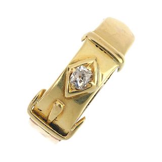 A late Victorian 18ct gold diamond buckle ring. Designed as a buckle, with old-cut diamond highlight
