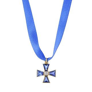 A diamond and sapphire cross pendant. Designed as a trapezoid-shape sapphire Maltese cross, with old