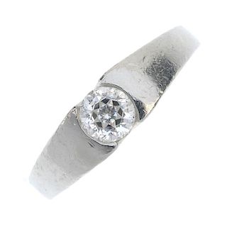 A platinum diamond single-stone ring. The fancy circular-cut diamond, weighing 0.51ct, to the tapere