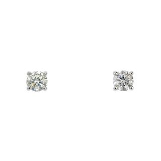 A pair of brilliant-cut diamond ear studs. Estimated total diamond weight 0.50ct, I-K colour, P2 cla