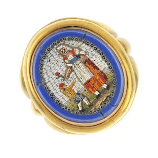 A late 19th century gold micro mosaic ring. Depicting a lady handing a red flower to a young boy, wi