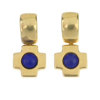 A pair of lapis lazuli ear pendants. Each designed as a cross-shape drop, set with a lapis lazuli ca