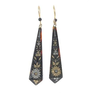 A pair of late 19th century pique tortoiseshell ear pendants. Each designed as a tapered foliate pan